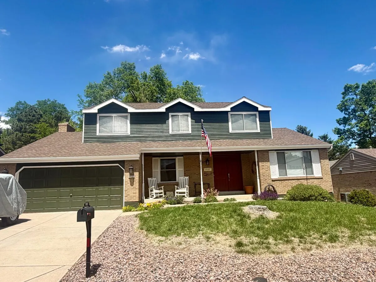 Exterior repaint of a Littleton, CO home by Kind Home Painting